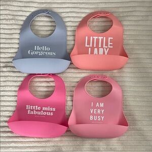 NWOT 4 piece Silicone Bib Set